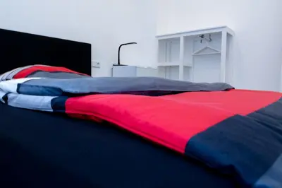 Ein Bett oder Betten in einem Zimmer der Unterkunft Zimmervermietung Dietzenbach