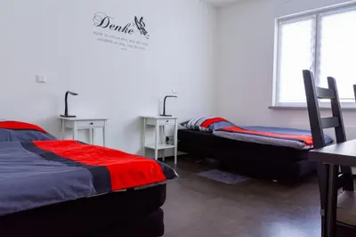 Ein Bett oder Betten in einem Zimmer der Unterkunft Zimmervermietung Dietzenbach
