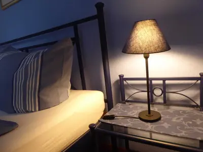 Ein Bett oder Betten in einem Zimmer der Unterkunft Ferienwohnungen Dora