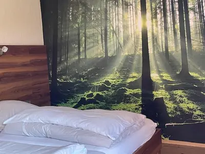 Ein Bett oder Betten in einem Zimmer der Unterkunft Landgasthof Hirsch