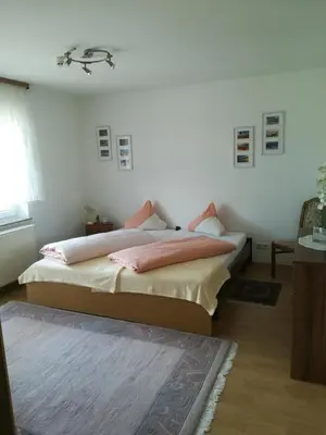 Ein Bett oder Betten in einem Zimmer der Unterkunft Ferienwohnung 