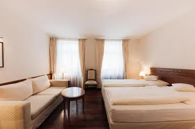 Ein Bett oder Betten in einem Zimmer der Unterkunft Hotel Weisser Bock