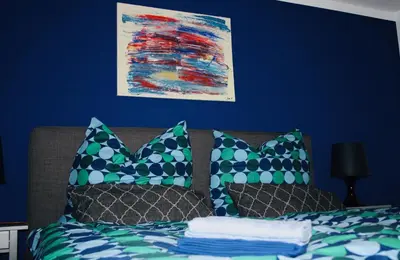 Ein Bett oder Betten in einem Zimmer der Unterkunft Schöne 60qm große Wohnung Mainz-Lerchenberg ZDF