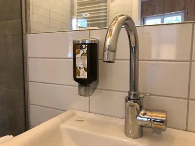 Ein Badezimmer in der Unterkunft Heimatlodge