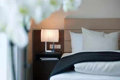 Ein Bett oder Betten in einem Zimmer der Unterkunft SeeHotel Ketsch