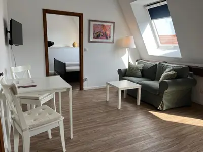 Ein Sitzbereich in der Unterkunft Weingärtner Appartements