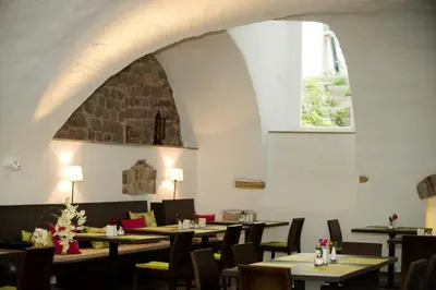 Ein Restaurant oder anderes Speiselokal in der Unterkunft Hotel Residenz am Königsplatz