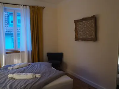 Ein Bett oder Betten in einem Zimmer der Unterkunft Emmas