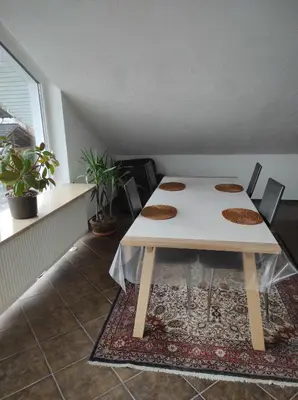 Ein Sitzbereich in der Unterkunft Ferienwohnung Gartenblick