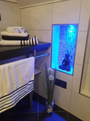 Ein Bett oder Betten in einem Zimmer der Unterkunft GÄSTEHAUS LIFESTYLE