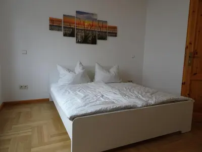 Ein Bett oder Betten in einem Zimmer der Unterkunft Zimmer am Museum