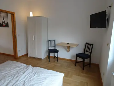 Ein Bett oder Betten in einem Zimmer der Unterkunft Zimmer am Museum