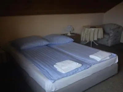 Ein Bett oder Betten in einem Zimmer der Unterkunft Hotel zur Küferschenke