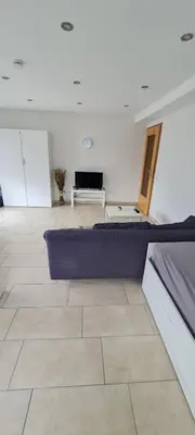 Ein Sitzbereich in der Unterkunft Ferienwohnung im Grünen