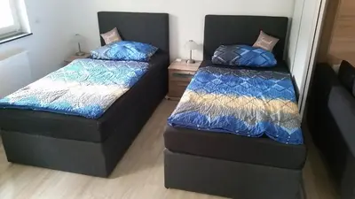 Ein Bett oder Betten in einem Zimmer der Unterkunft Ferienwohnung Sandra Hockenheim