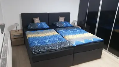 Ein Bett oder Betten in einem Zimmer der Unterkunft Ferienwohnung Sandra Hockenheim