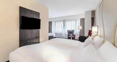 Ein Bett oder Betten in einem Zimmer der Unterkunft PLAZA INN Mannheim