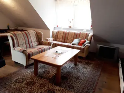 Ein Sitzbereich in der Unterkunft Ferienwohnung Farrenkopf