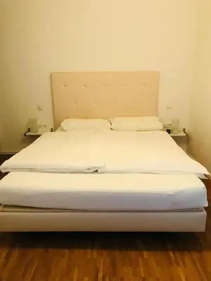 Ein Bett oder Betten in einem Zimmer der Unterkunft Modernes Apartment - Neustadt/Weinstraße Stadt