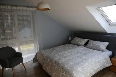 Ein Bett oder Betten in einem Zimmer der Unterkunft Apartment mit Designerküche, Loggia Ludwigsburg nahe Stuttgart