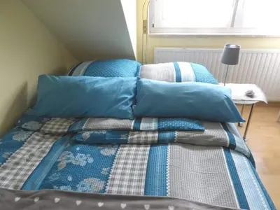 Ein Bett oder Betten in einem Zimmer der Unterkunft Ferienzimmer Bella Casa