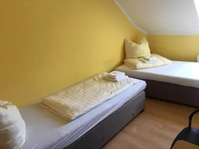 Ein Bett oder Betten in einem Zimmer der Unterkunft Zweibettzimmer