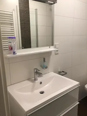 Ein Badezimmer in der Unterkunft Zweibettzimmer