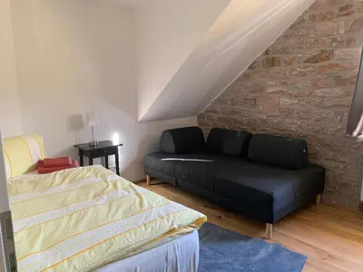 Ein Sitzbereich in der Unterkunft Gästehaus Windheim (Ettlingen)