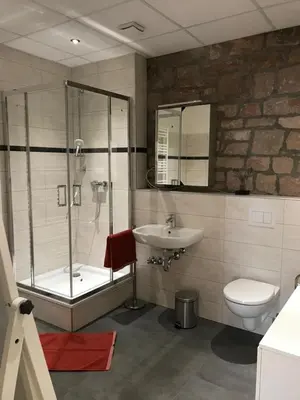 Ein Badezimmer in der Unterkunft Gästehaus Windheim (Ettlingen)
