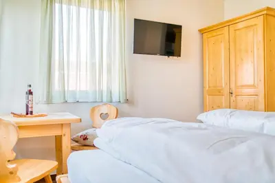 Ein Bett oder Betten in einem Zimmer der Unterkunft Gästehaus Weingut Politschek