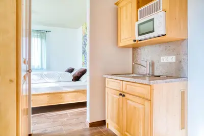 Ein Bett oder Betten in einem Zimmer der Unterkunft Gästehaus Weingut Politschek