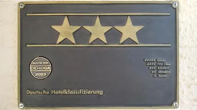 Ein Zertifikat, Auszeichnung, Logo oder anderes Dokument, das in der Unterkunft Hotel Arheilger Hof ausgestellt ist