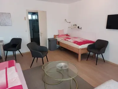Ein Bett oder Betten in einem Zimmer der Unterkunft Apartment-Ferienwohnung in Mainaschaff