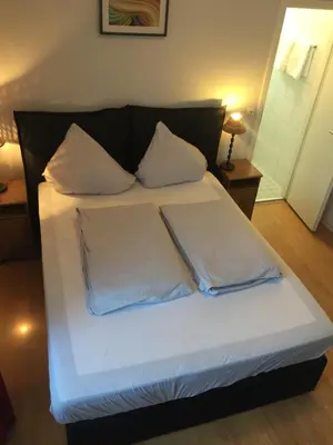 Ein Bett oder Betten in einem Zimmer der Unterkunft The Dubliner Hotel & Irish Pub