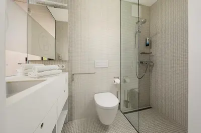 Ein Badezimmer in der Unterkunft Hotel Bergamo Modern & zentral in Ludwigsburg 24h Check in 3 Min zum Schloss nachhaltiges Hotel in Holzbauweise