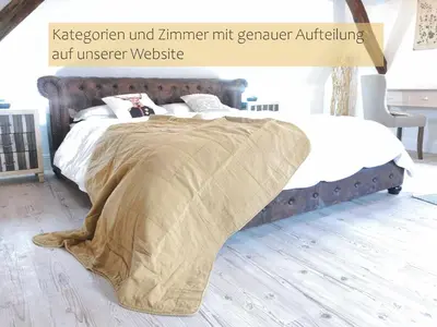 Ein Bett oder Betten in einem Zimmer der Unterkunft LANDHOTEL 1707 by Landgasthof Zickler