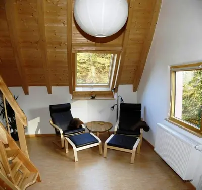 Ein Sitzbereich in der Unterkunft Ferienhaus In der Erlebach