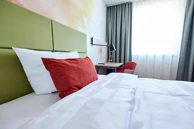 Ein Bett oder Betten in einem Zimmer der Unterkunft Best Western Hotel Viernheim Mannheim