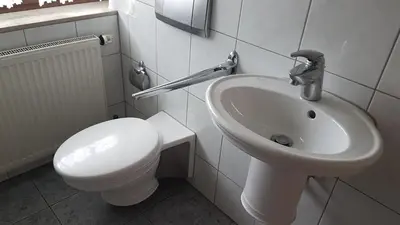 Ein Badezimmer in der Unterkunft Gino s Ferienwohnung