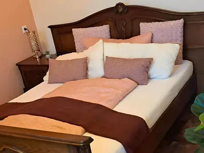 Ein Bett oder Betten in einem Zimmer der Unterkunft Barocker Hof Rhodt