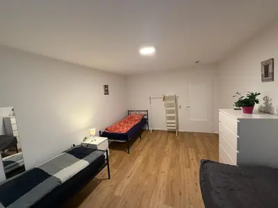 Ein Bett oder Betten in einem Zimmer der Unterkunft Big, cosy and central apartment