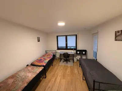Ein Bett oder Betten in einem Zimmer der Unterkunft Big, cosy and central apartment