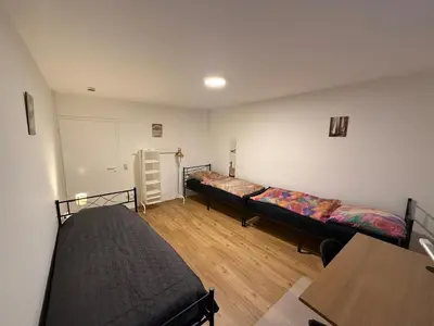 Ein Bett oder Betten in einem Zimmer der Unterkunft Big, cosy and central apartment