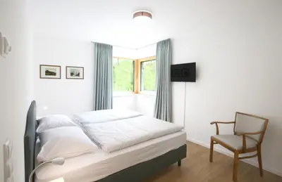 Ein Bett oder Betten in einem Zimmer der Unterkunft Ferienhaus Münzberg