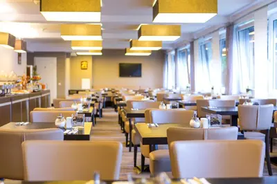 Ein Sitzbereich in der Unterkunft Zi Hotel