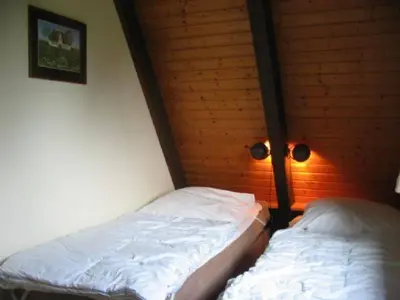 Ein Bett oder Betten in einem Zimmer der Unterkunft Holiday park- Winnetou