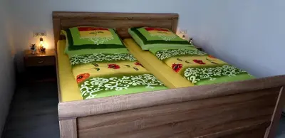 Ein Bett oder Betten in einem Zimmer der Unterkunft Komfortable Ferienwohnung