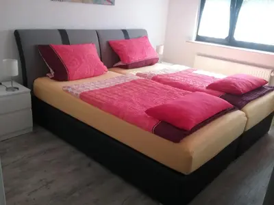 Ein Bett oder Betten in einem Zimmer der Unterkunft Schöne zwei Zimmer Wohnung