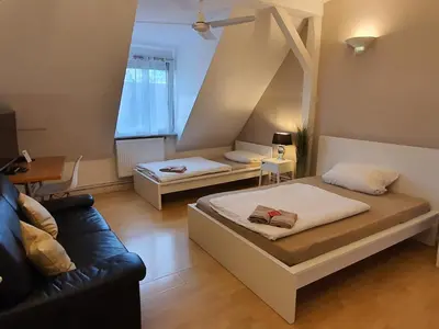 Ein Bett oder Betten in einem Zimmer der Unterkunft coLodging Mannheim - private rooms & kitchen