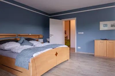 Ein Bett oder Betten in einem Zimmer der Unterkunft Ferienwohnung Casa Rossa